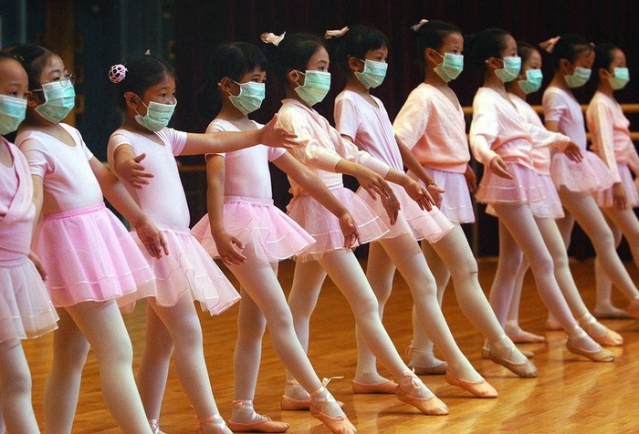Ballerinas practice with medical masks during the SARS outbreak. [2003] 