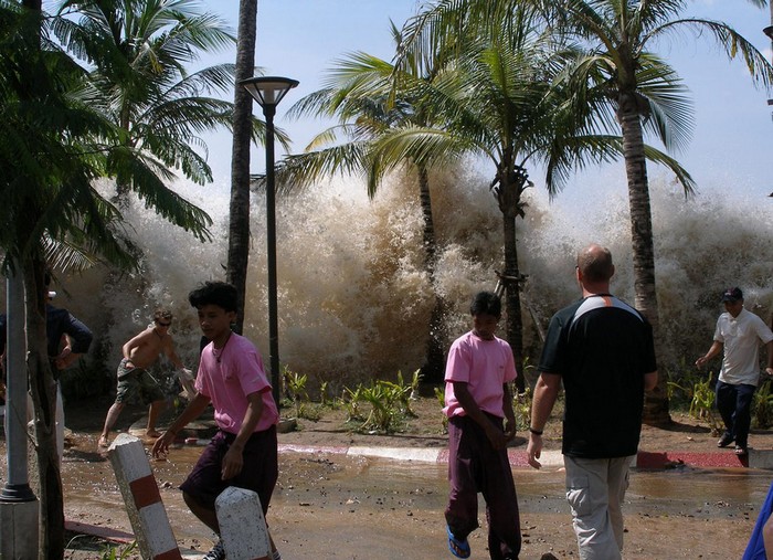 The first waves of the 2004 Indian Ocean Tsunami, which killed over 200,000 people, hit the shore. Source: Unknown Photographer