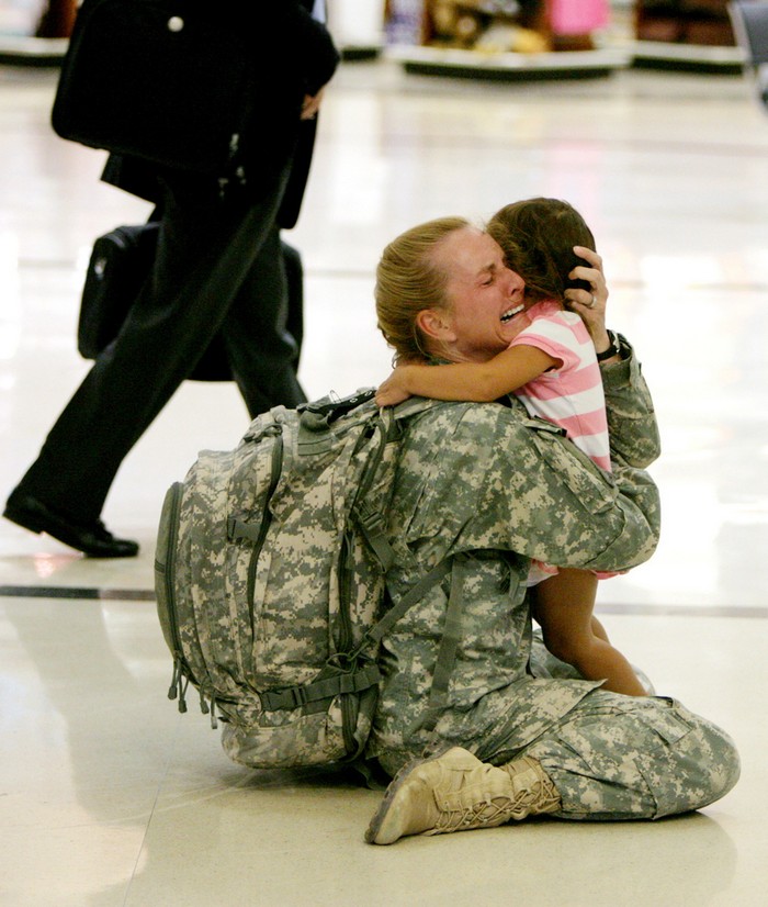 Terri Gurrola is reunited with her daughter after serving in Iraq for 7 months. [2007] Source: BuzzFeed