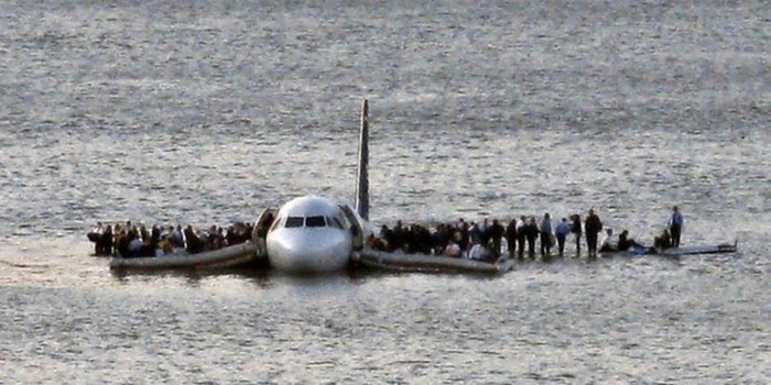  US Airways Flight 1549 floats on the Hudson river after crash landing, miraculously, everyone survived [2009] Source: Unknown Photographer