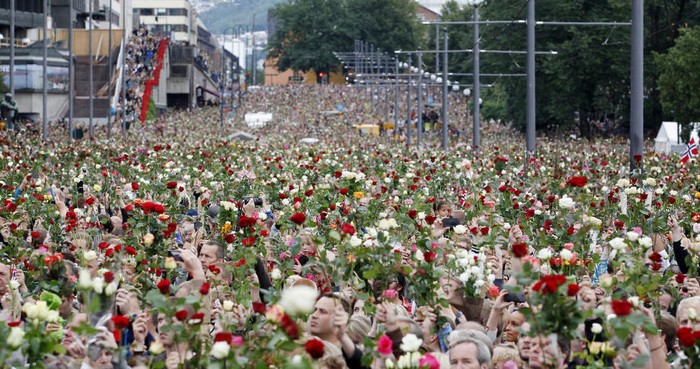 Norwegian citizens hold a flower march after terrorist attacks by Anders Breivik killed 77. [2011] Source: Unknown Photographer